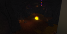 The Halloween version of the Cave Garden with a fire.