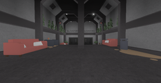A prior view of the lobby of the Reception Room, with a door leading to the Surface Elevator Hub.